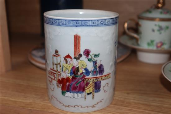 A pair of Paris porcelain chocolate cups, covers and stands, a Samson mug and an ironstone strainer